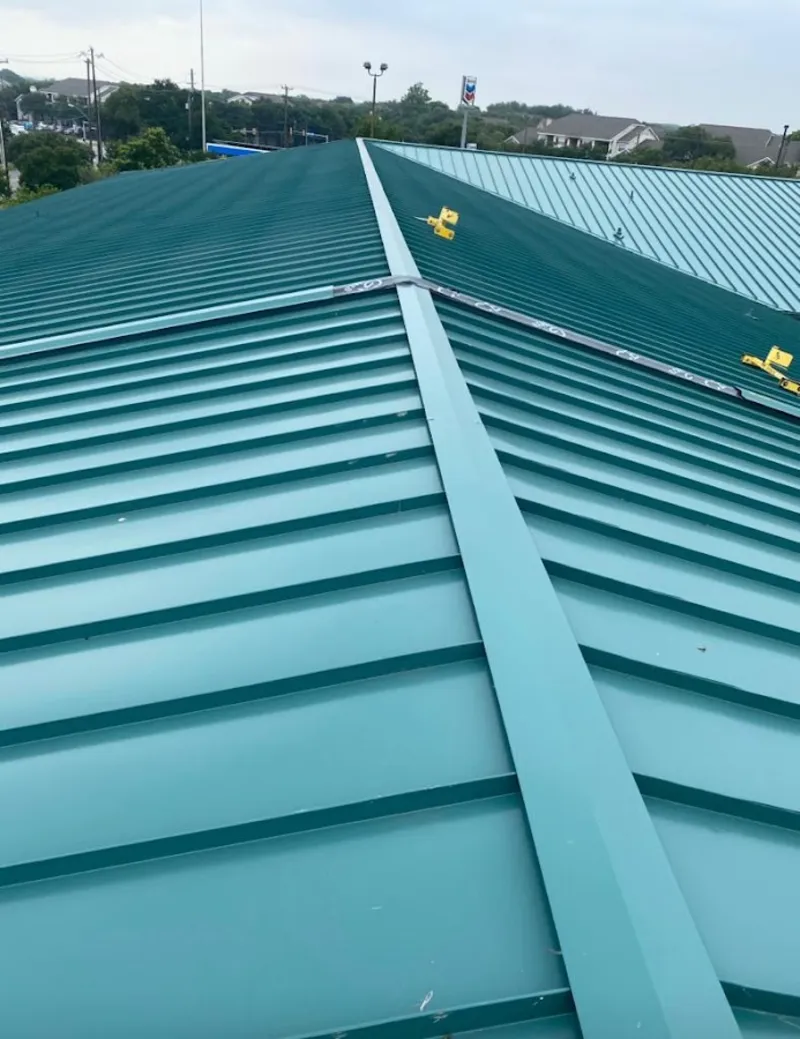 Green commercial metal roof ridge and valley for Metal Roof Repair in Bradford